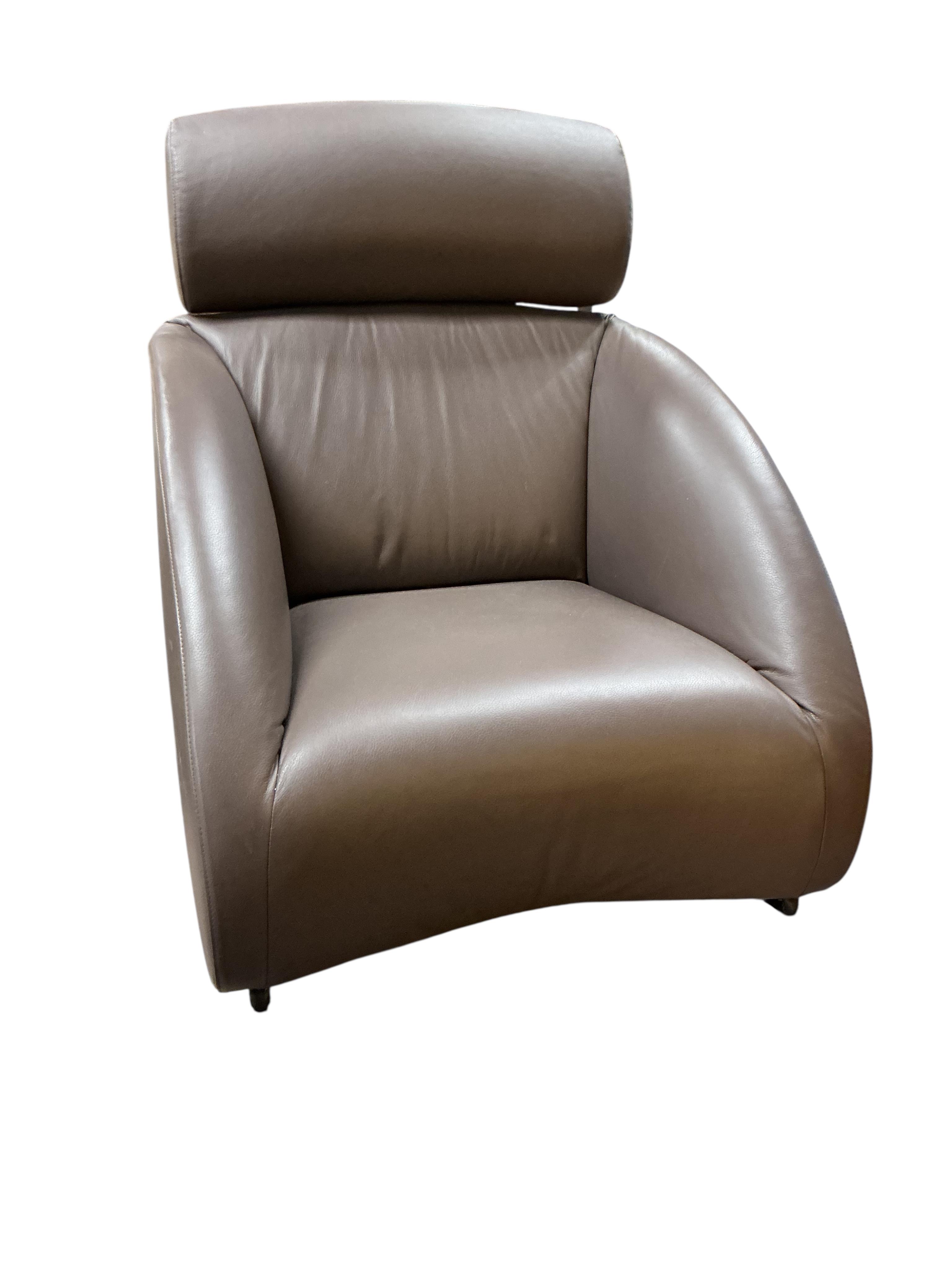 A Contemporary brown leather rocking chair, width 76cm, depth 88cm, height 90cm